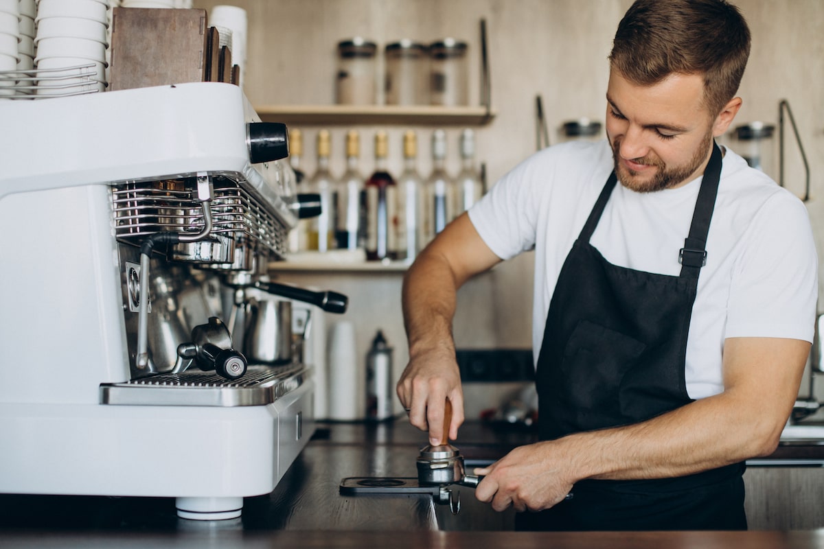 https://work-europe.eu/wp-content/uploads/2022/04/male-barista-preparing-coffee-coffee-shop-2-min.jpg